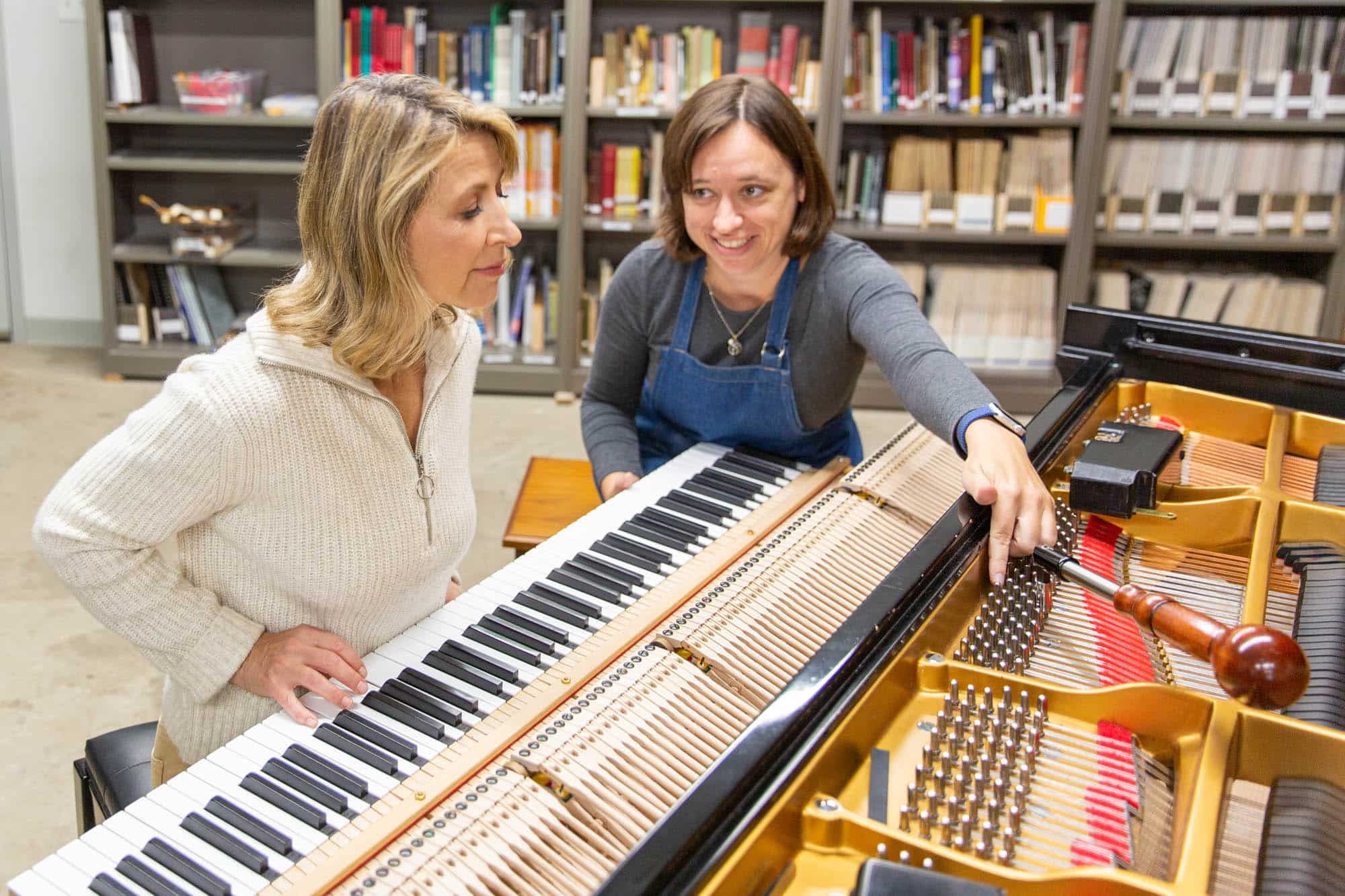 Makers - Samantha learning about piano tuning with Emily Townsend at the North Bennett Street School in Boston MA